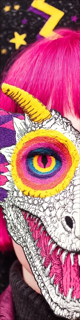 Free printable close-up dragon face bookmark